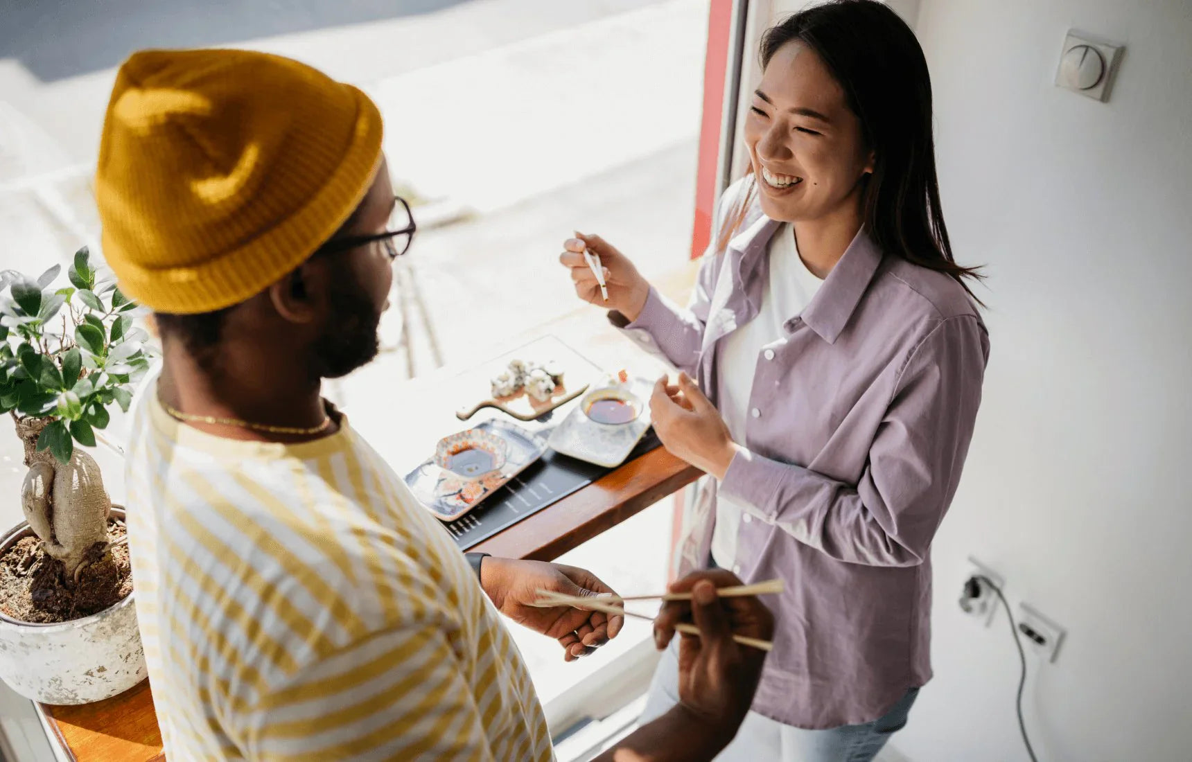 man and woman cooking